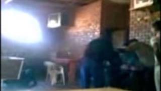 Uitenhage policemen watch as young men are assaulted