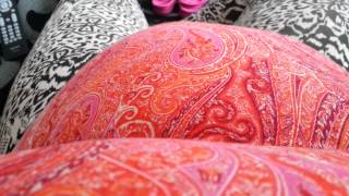 Baby kicking pregnant belly
