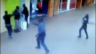 Blink and it's gone: Robbers overwhelm cash guard