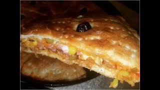 البيتزا المغطاة الهائلة ستحبينها انت وأطفالك لذييذة جداا وسهلة التحضير???