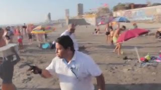 Bañistas defienden a vendedor de empanadas de inspectores en Iquique