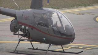 Robinson R-22 taking off from LELL (from TWY T-2)