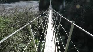walking on suspension bridge