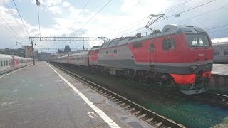 Russian EP2K Locomotive and a passenger train loud departure