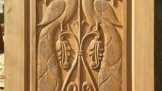 Peacock main door ? design 
Wood carving tesla