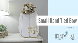 How To Make a Small Hand Tied Funky Bow using Scrap Ribbon