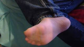 Candid nylon feet with jeans