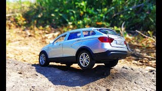 Машинки. Открываю модельку машинку Lada Vesta SW Cross распаковка и обзор.