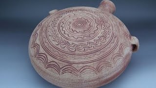 Обтачивание глиняных изделий на оправке