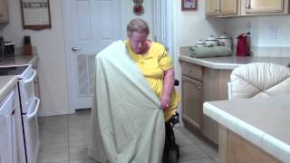 Monica Vickers - One-handed amputee folding towel and sheet