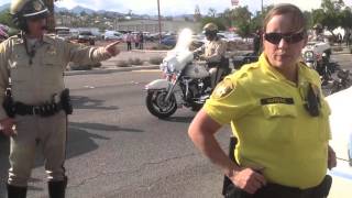 Man arrested has spit hood on and is Hogtied by Police at Biker event