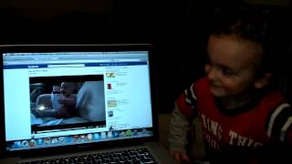 Dude cracking up at Baby Micah laughing at ripping paper