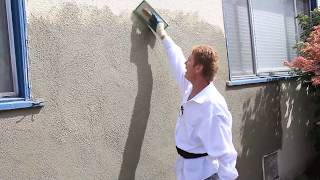 Plaster on scratch and second coat wet float apply texture dash coat