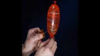 Popping Water Balloons in Zero Gravity: Slow Motion