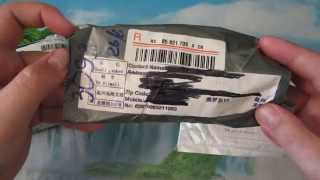 Посылка № 63 64 65 с Aliexpress Тату держатель, Те Гуань Инь, наушники молния