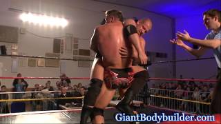 German giant bodybuilder gives the hardest bear hug, superhuman strength.