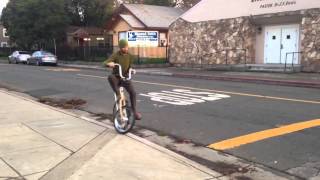 Swing bike curb tricks