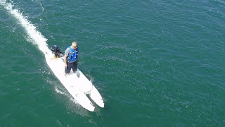 Power kayak: Wavewalk® 700 with 6 HP Tohatsu outboard motor