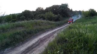 Подъем на возвышенность под углом в 10* на КамАЗе 53229 груженым полной бочкой воды