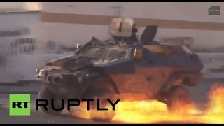 Bahrain: Watch protesters BATTER armoured vehicles with Molotov cocktails