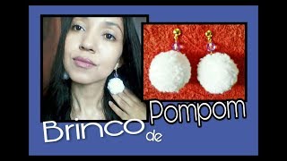 Brinco de pompom com miçanga
