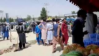 Afghanistan: Crowds gather outside Kabul airport as thousands seek to flee