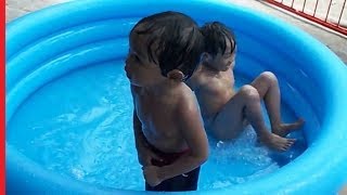 Swimming in portable pool,baby boy who pee anywhere