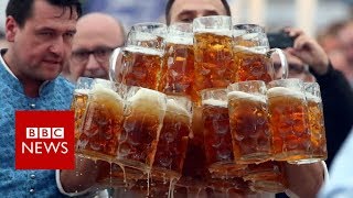 Man carries 29 beers to beat own record - BBC News