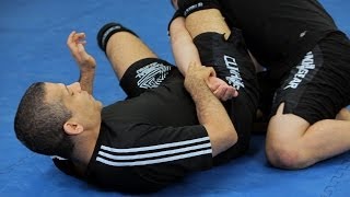 How to Do an Omoplata | MMA Submissions