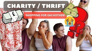 BUYING CHARITY / THRIFT SHOP OUTFITS FOR EACH OTHER | JAMES & CARYS