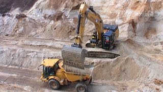 Cat 349E Excavator Loading Semi Trucks And Hydrema Dumper
