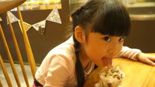 little girl eating ice-cream by Kate