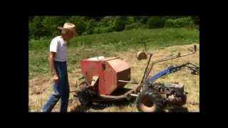 BALING HAY MULCH AND ROLLING MULCH IN GARDEN