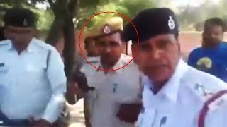 Public forced traffic police to issue challan  against another cop , Watch Video