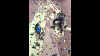 Bionic amputee model Rebekah Marine rock climbing with new friend Lily.