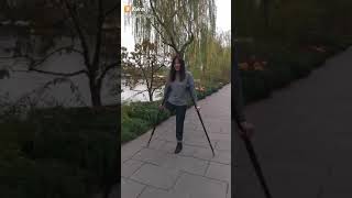 Onelegged Chinese girl walks on crutches