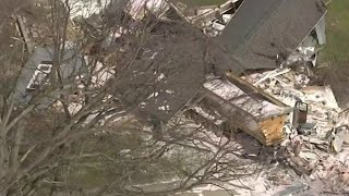 Semi truck destroys Macomb County home