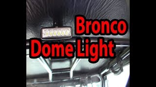 Early bronco dome light wire through roll cage tube install, fish wire inside roll cage