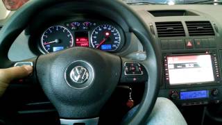 Instalação de central multimídia e volante multifuncional VW