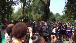 Abbie Morris carries the Olympic Torch through Clapham