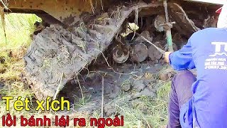 Máy kéo lúa bánh xích mắc lầy kéo lên tét luôn bánh xích lồi bánh lái ra ngoài cắt xích mới lấy được