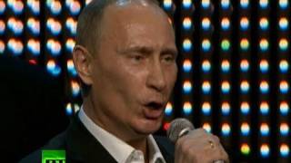 Singing PM: 'Fats' Putin over the top of 'Blueberry Hill' with piano solo