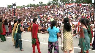 Indian women dancing hand in hand with foreign lady, Wagah Border