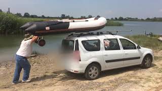 Копия видео "Погрузка лодки ПВХ на багажник авто"