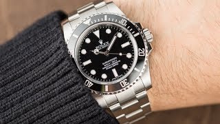 Rolex Submariner no date 114060 Black dial 40 mm stainless steel swiss made luxury watch on wrist