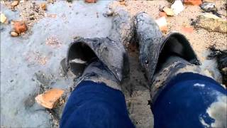 Black leaky wellies in deep sticky mud that gets on my leggings, gloves and socks