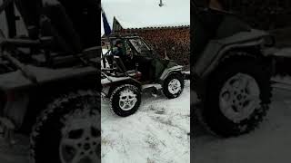 Чистка снега самодельным отвалом.