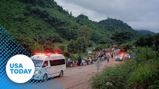 Four boys pulled from Thai cave in risky rescue mission