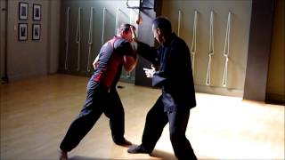 Taijiquan applications: left single whip to raise arm step forward