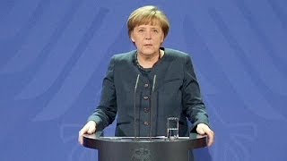Merkel's coalition shaken by minister's departure.